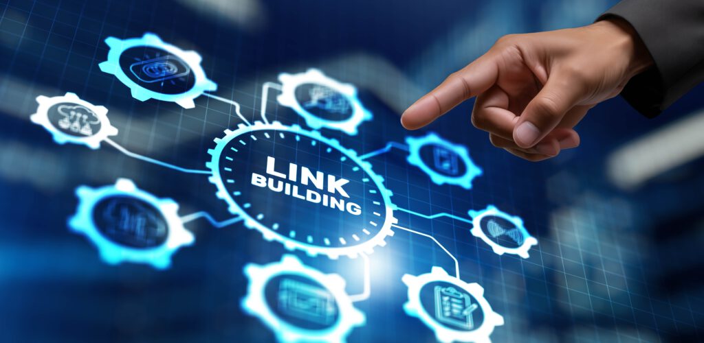 Ein Finger tippt auf ein Bildschirm, wo drauf steht "Link Building"